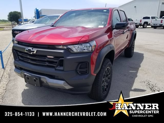 2026 Chevrolet Colorado Trail Boss in Radiant Red Tintcoat — front three-quarter view