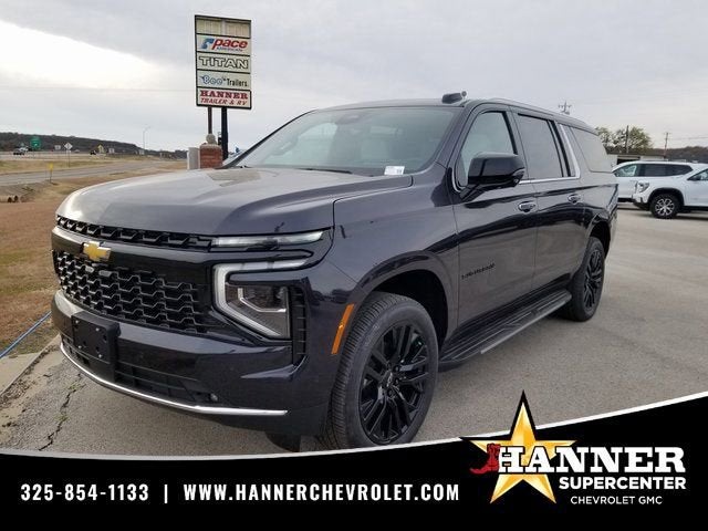 2026 Chevrolet Suburban Premier in Dark Ash Metallic — front three-quarter view