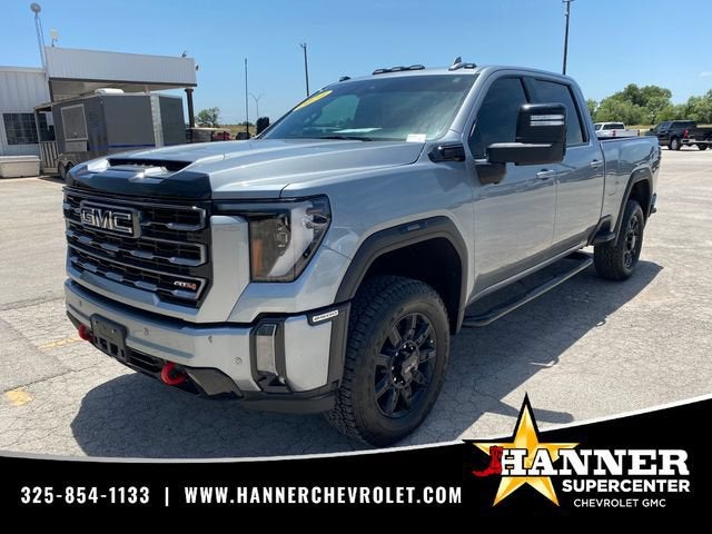 2024 GMC Sierra 2500 HD AT4 in Sterling Metallic — front three-quarter view