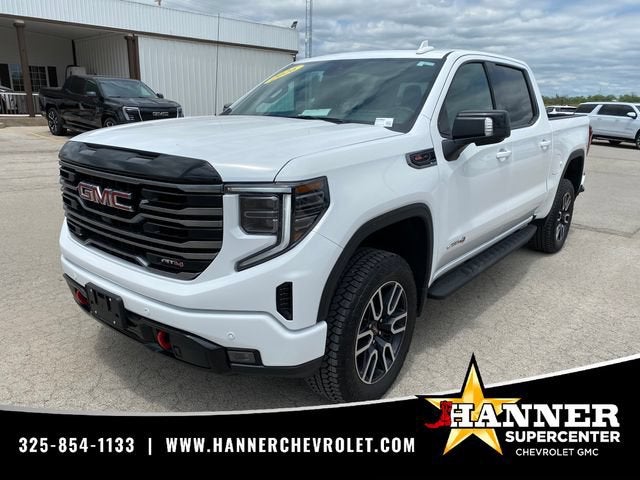 2026 GMC Sierra 1500 AT4 in Summit White — front three-quarter view